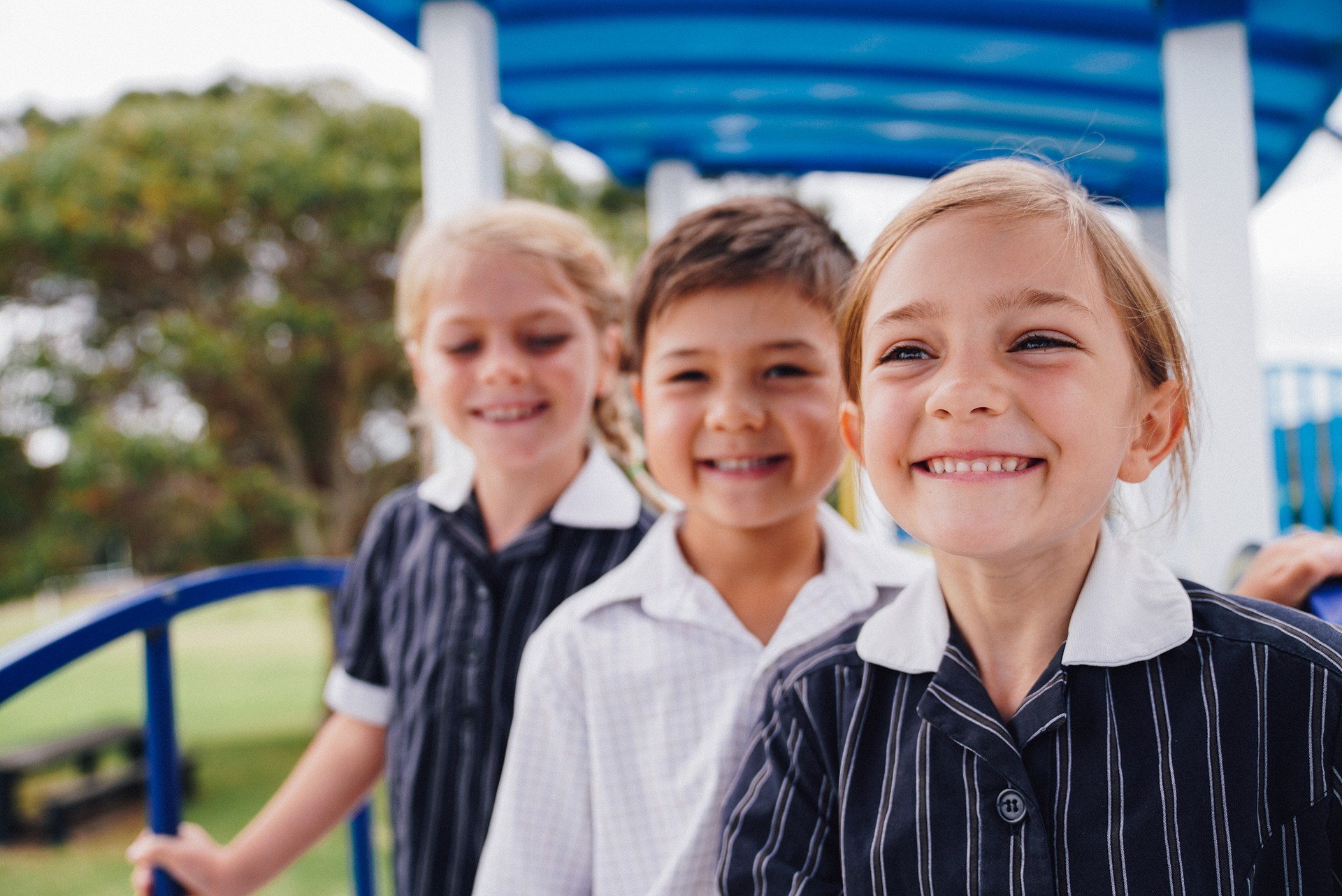 Three smiling Year 1 students from ACC Benalla