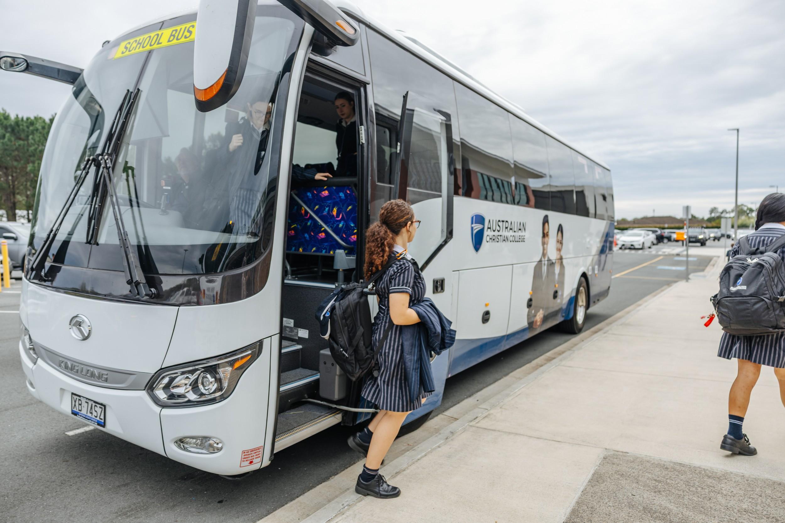 Students boarding the ACC Launceston school bus