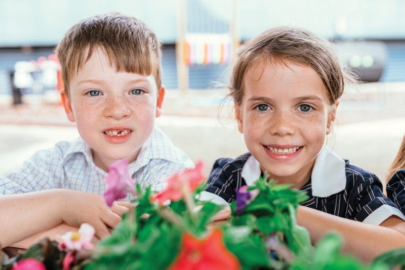 Boy and girl Kindergarten students from Singleton learning together at co-educational school