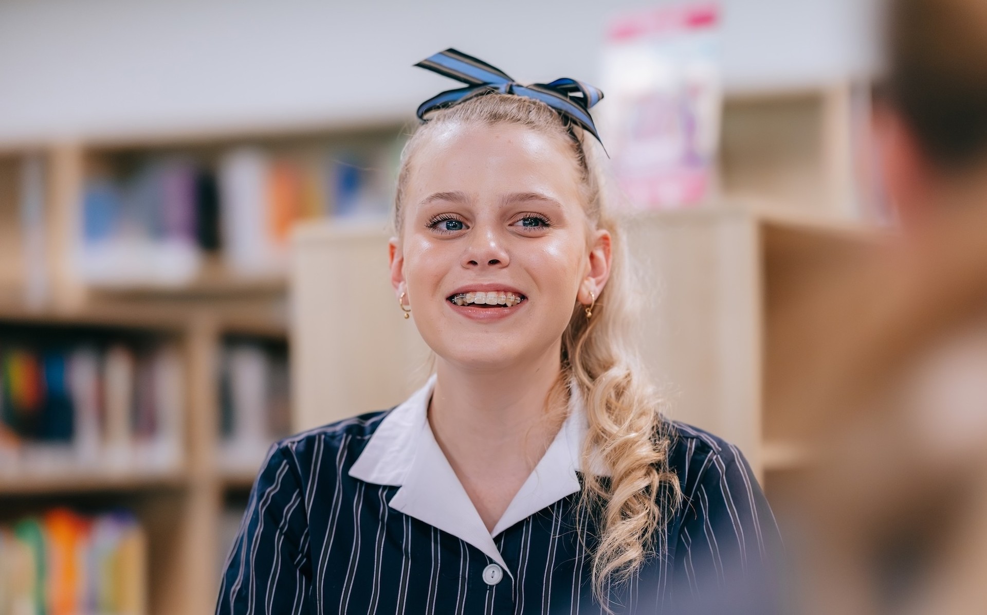 Happy Secondary student in the classroom