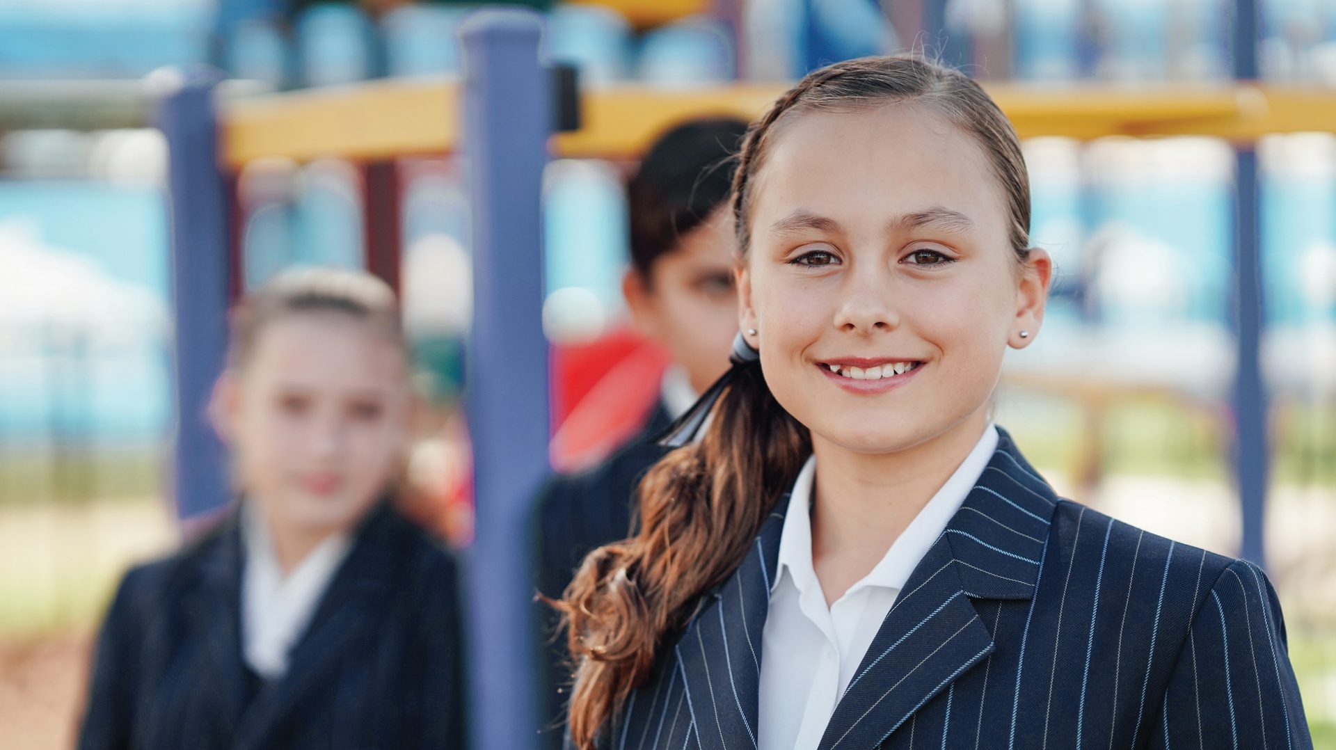 Smiling Singleton year 7 student wearing ACC Singleton school uniform blazer